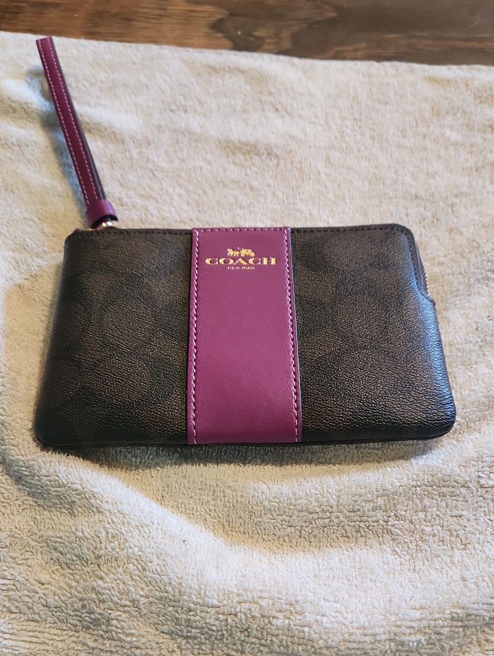 COACH Brown Signature Canvas Wristlet with Purple Center Panel